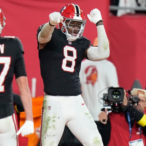 Atlanta Falcons tight end Kyle Pitts Sr. (8) celebrates his touchdown against the Tampa Bay Buccaneers during the first half of an NFL football game, Thursday, Dec. 11, 2025, in Tampa, Fla. (AP Photo/Chris O'Meara)
