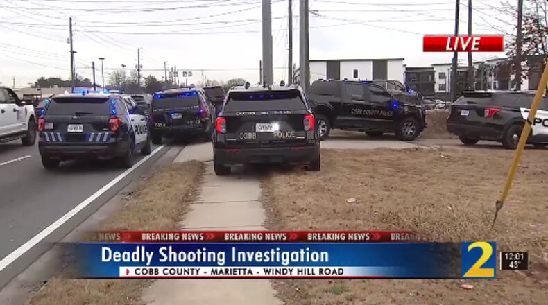 Marietta police are searching for a suspect in a deadly shooting near Windy Hill Road and Cobb Parkway on Wednesday afternoon.