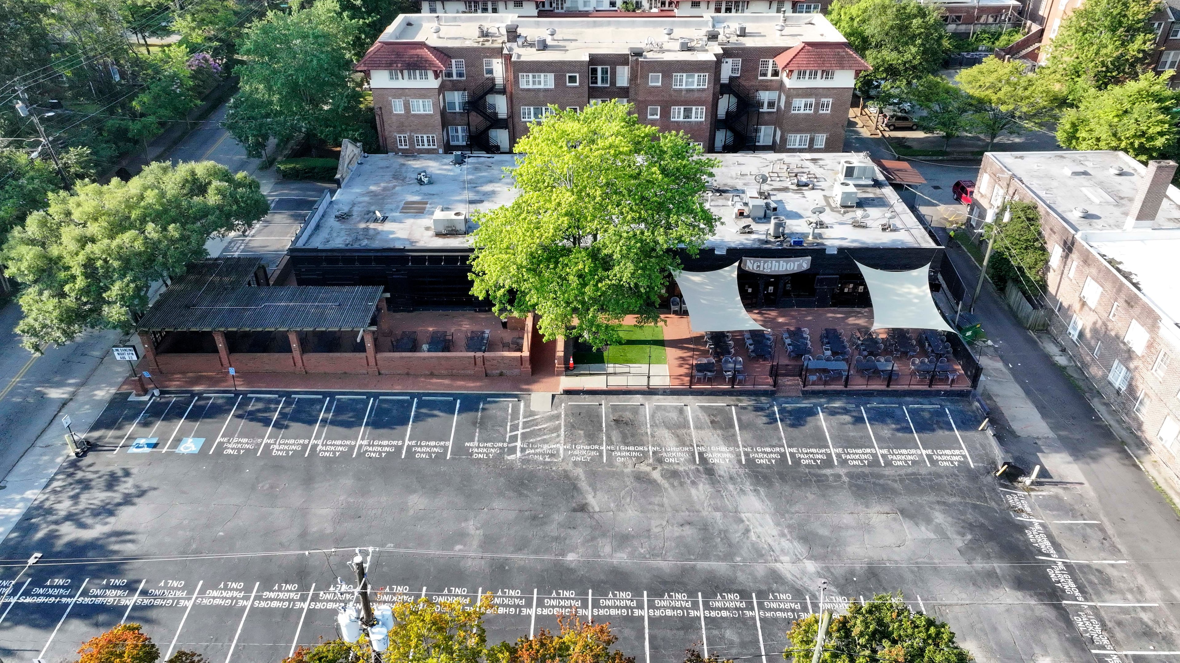 Sergey Khotimskiy once owned the building that Neighbor's Pub occupies on North Highland Avenue in Virginia-Highland. The pub’s owner, Doug Landau, later became alarmed when he learned that the U.S. Treasury Department included Khotimskiy on a list of sanctioned Russian elites. (Miguel Martinez/AJC)