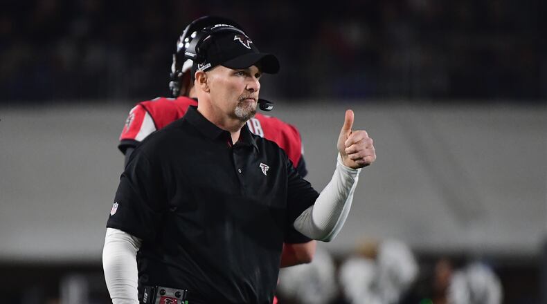 LOS ANGELES, CA - JANUARY 06: Head coach Dan Quinn of the Atlanta Falcons reacts from the sidelines during the second quarter of the NFC Wild Card Playoff game against the Los Angeles Rams at Los Angeles Coliseum on January 6, 2018 in Los Angeles, California. (Photo by Harry How/Getty Images)