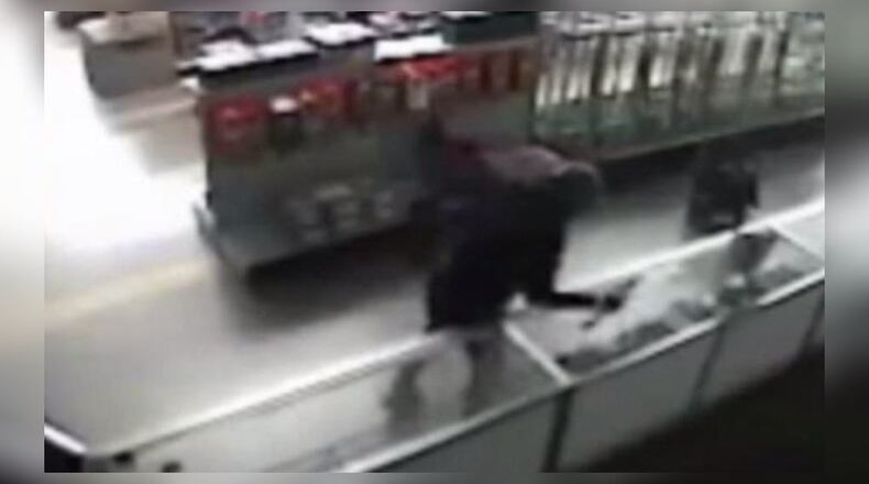 DeKalb police are searching for four men accused in a pawn shop burglary.