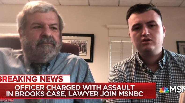 Officer Devin Brosnan (right) and his attorney, Don Samuel (left), appeared on MSNBC on Thursday night.
