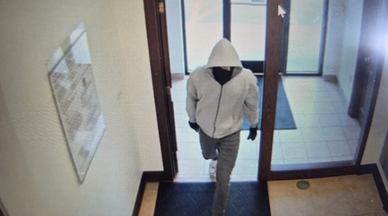 This image released by Kentucky State Police shows a suspect in a fatal bank robbery at a U.S. Bank in Berea, Ky., Thursday, April 30, 2026. (Kentucky State Police via AP)