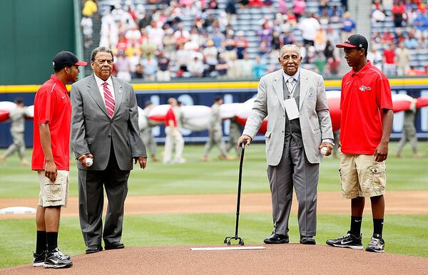 ATLANTA, GA - MAY 15:  Former United States Ambassador to the United Nations Andy Young (L) and Civil Rights leader Rev. Joseph Lowery (R) prepare for the first pitches prior to the Civil Rights game between the Atlanta Braves and the Philadelphia Phillies at Turner Field on May 15, 2011 in Atlanta, Georgia.  (Photo by Kevin C. Cox/Getty Images)