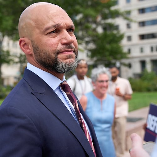 Congressional delegate candidate Robert White greets supporters after attending a news conference at Freedom Plaza in Washington, Monday, Aug. 24, 2026. (AP Photo/Jacquelyn Martin)