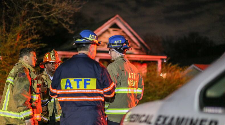 Authorities investigate a fire that left a baby dead and a mother critically burned in northwest Atlanta. JOHN SPINK / JSPINK@AJC.COM