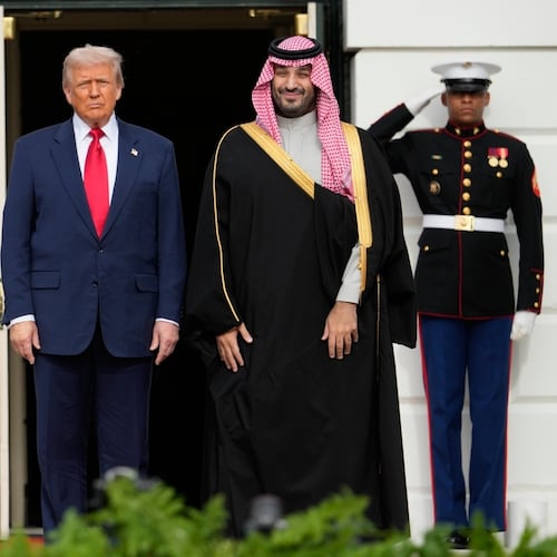President Donald Trump stands with Saudi Arabia's Crown Prince Mohammed bin Salman on his visit to the White House, Tuesday, Nov. 18, 2025, in Washington. (AP Photo/Mark Schiefelbein)