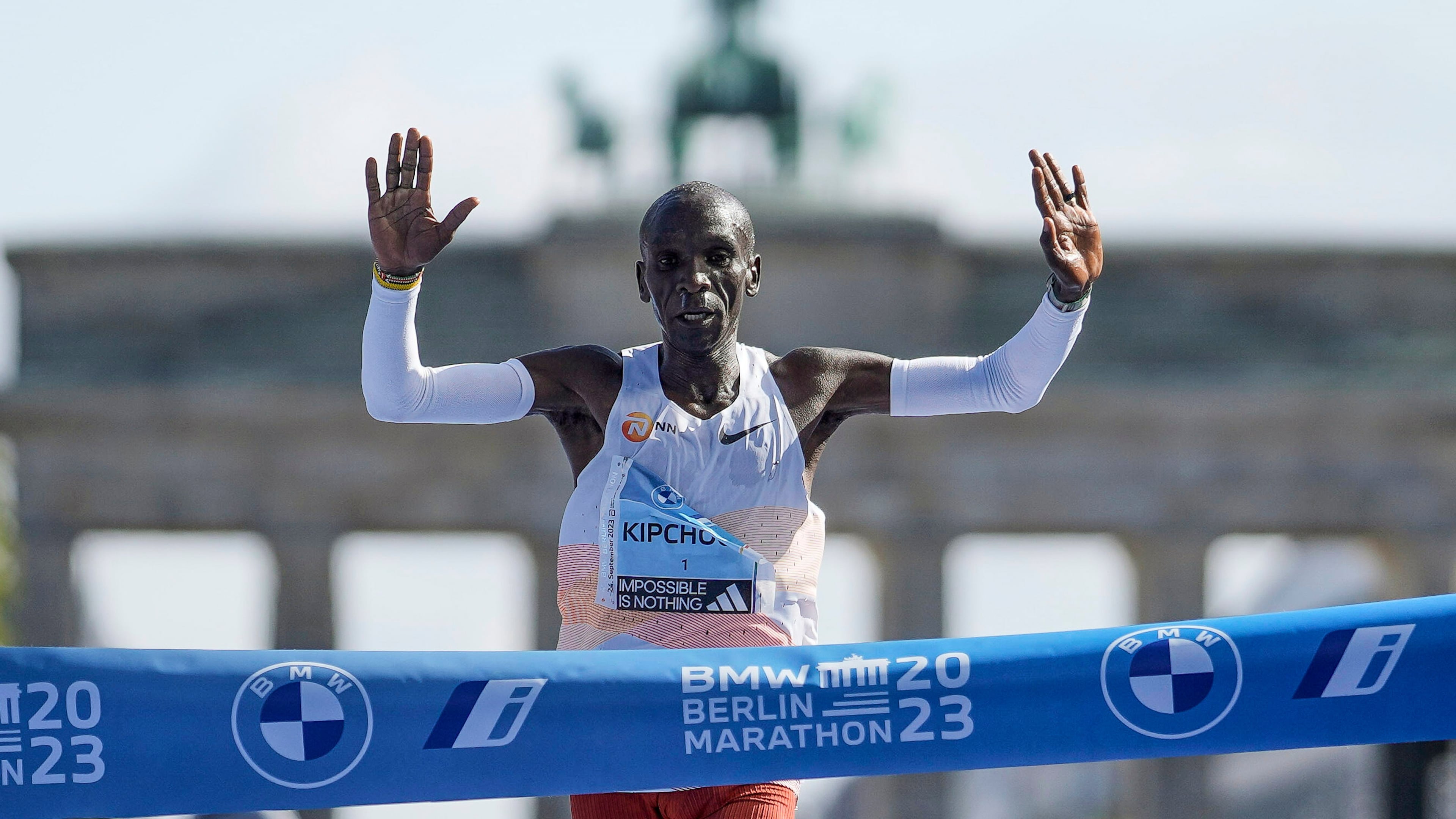 FILE - Kenya's Eliud Kipchoge crosses the line to win the men's division of the Berlin Marathon in Berlin, Germany, Sunday, Sept. 24, 2023. (AP Photo/Markus Schreiber, FILE_