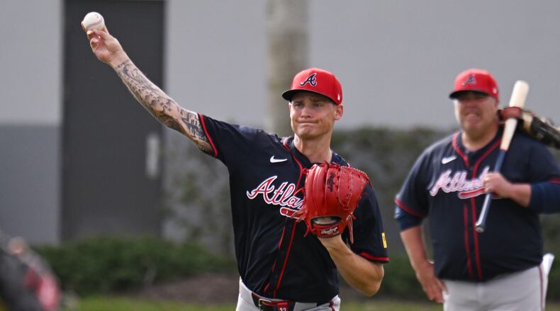 Atlanta Braves pitcher AJ Smith-Shawver throws a ball during spring training workouts at CoolToday Park, Sunday, February 16, 2025, North Port, Florida. (Hyosub Shin / AJC)