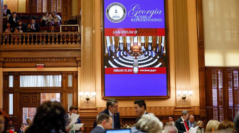 Georgia legislators gather for a long day Thursday. It was Crossover Day at the General Assembly, the 28th day of the 40-day session and a deadline when bills typically must clear at least one chamber to become law. Miguel Martinez /miguel.martinezjimenez@ajc.com