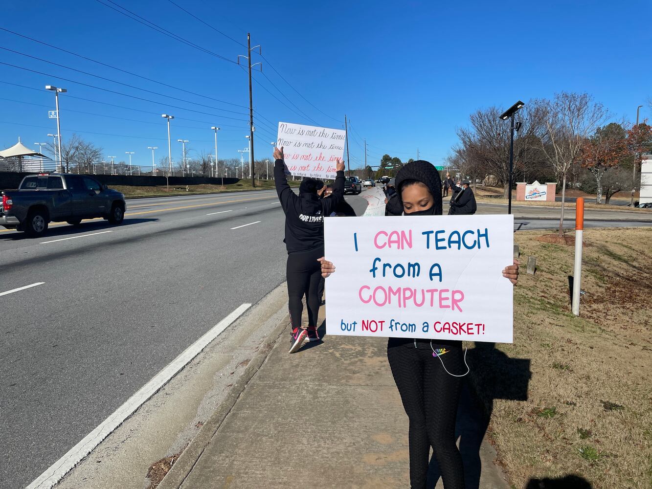 DeKalb residents rally against school reopening plans