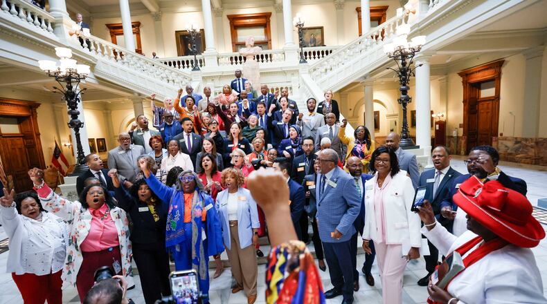 FILE - Georgia House Democrats walk out of the House Chamber in protest, after Senate Bill 185, which would outlaw spending on gender affirming care for transgender prisoners, was introduced at the state Capitol, April 2, 2025, in Atlanta. (Miguel Martinez/Atlanta Journal-Constitution via AP, File)