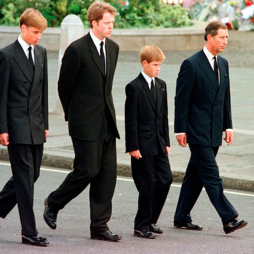 FILE - From left: Britain's Prince Philip, Prince William, Earl Spencer, Prince Harry and Prince Charles walk outside Westminster Abbey during the funeral procession for Diana, Princess of Wales, Sept. 6, 1997. (AP Photo/Jeff J. Mitchell, Pool, File)