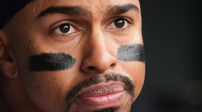 New York Mets' Francisco Lindor looks to the field during the ninth inning of a baseball game against the Chicago Cubs in Chicago, Sunday, April 19, 2026. (AP Photo/Nam Y. Huh)