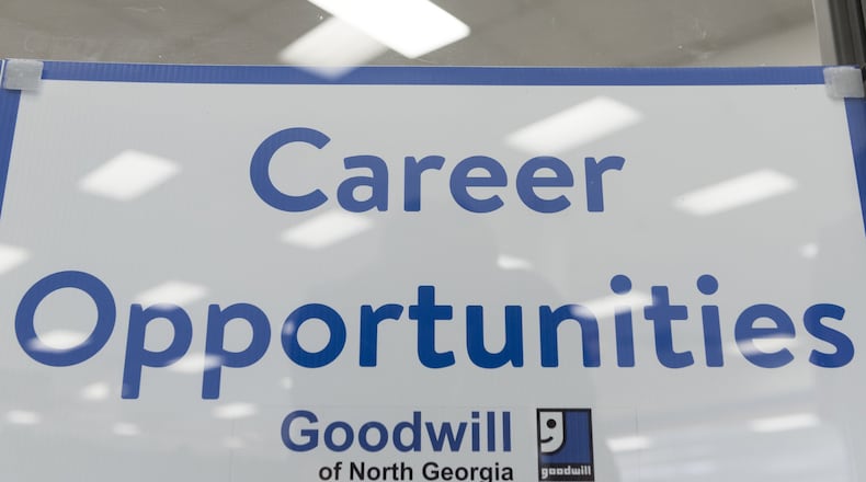 A sign in the window of the Goodwill of North Georgia’s career center in Oakwood, Georgia, in 2017. (DAVID BARNES / DAVID.BARNES@AJC.COM)