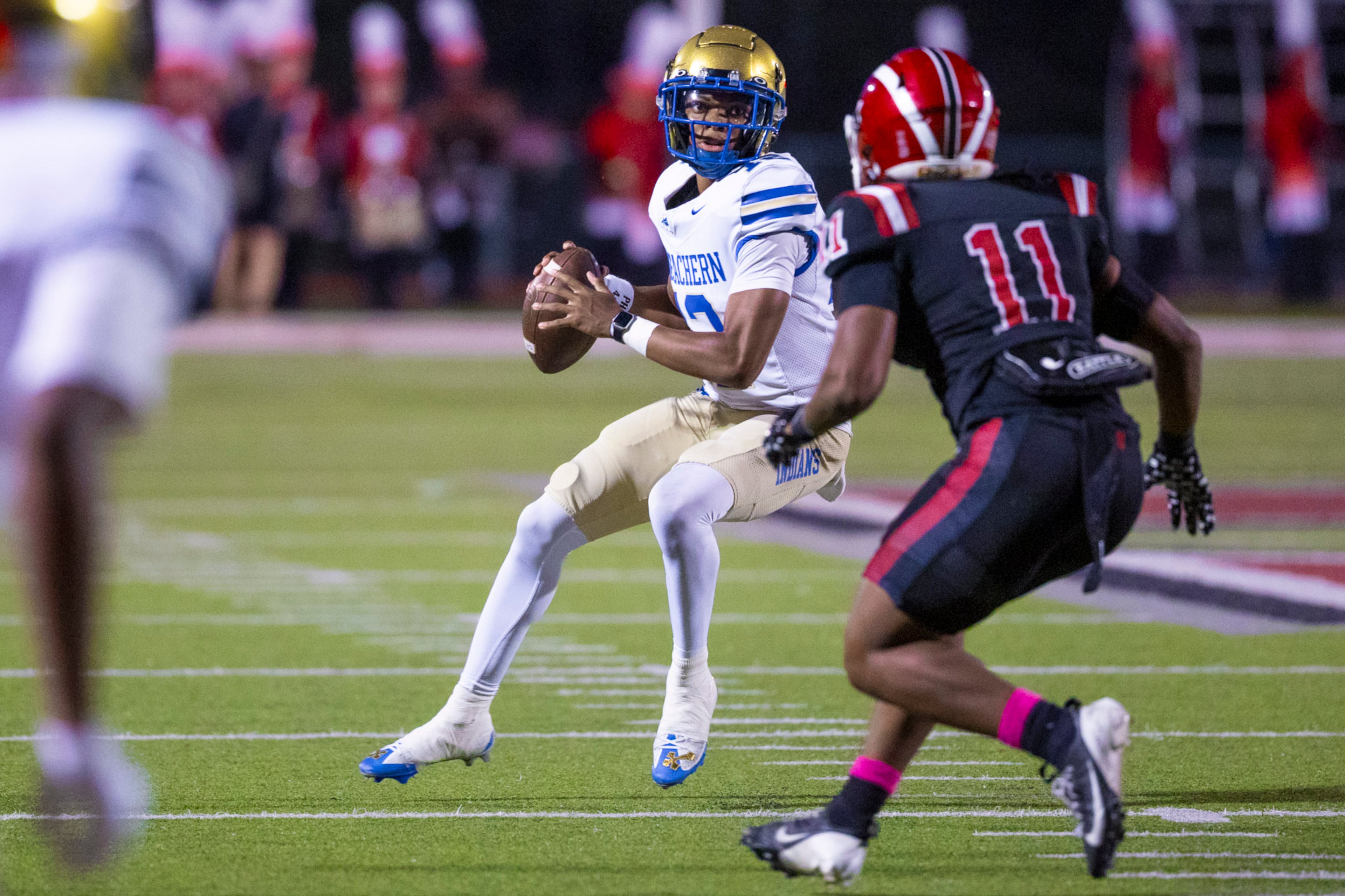 McEachern quarterback Calvin Pittman Jr (12) prepares to throw against Hillgrove at Cobb Energy Hillgrove Stadium in Powder Springs, GA on Friday, October 17th, 2025. (Oscar Guevara Saenz for the AJC)