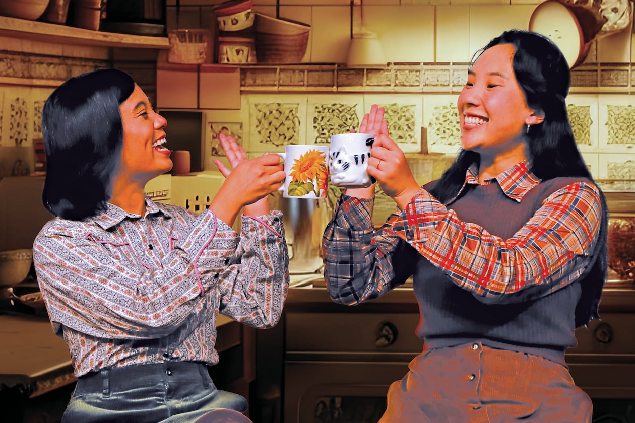 Two recently immigrated women, Luna (Jenine Florence Jacinto, left) and Jane (Michelle Pokopac), go from strangers to friends on Thanksgiving in Lloyd Suh’s “The Heart Sellers.” The play, directed by Michelle Chan, runs through Nov. 9 at Atlanta’s Horizon Theatre. (Courtesy of Horizon Theatre)