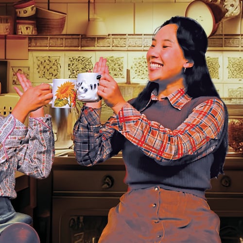Two recently immigrated women, Luna (Jenine Florence Jacinto, left) and Jane (Michelle Pokopac), go from strangers to friends on Thanksgiving in Lloyd Suh’s “The Heart Sellers.” The play, directed by Michelle Chan, runs through Nov. 9 at Atlanta’s Horizon Theatre. (Courtesy of Horizon Theatre)