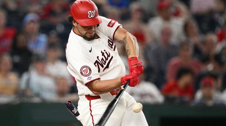 Washington Nationals' Yohandy Morales hits a double during the seventh inning of a baseball game against the Atlanta Braves, Tuesday, Sept. 1, 2026, in Washington. (AP Photo/Nick Wass)