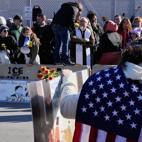 Protesters gather outside an ICE processing facility in Broadview, Ill. a suburb of Chicago, Friday, Oct. 24, 2025. (AP Photo/Nam Y. Huh)