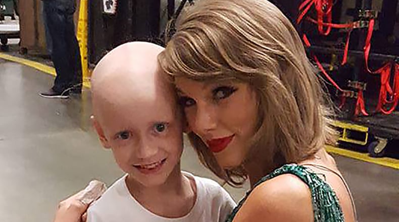 "Writing about Taylor Swift is a horrific ordeal for me because her twinkly persona is such a scary flashback to the fascist blondes who ruled the social scene during my youth,” says feminist writer Camille Paglia. Swift is shown here with a new friend, also named Taylor, before her sold-out Atlanta show.