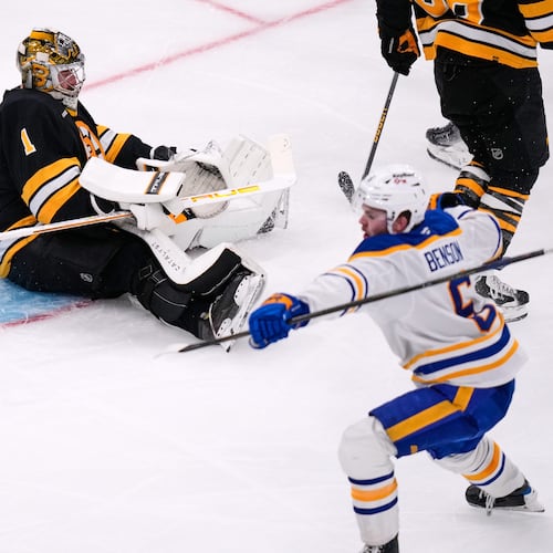 Boston Bruins goaltender Jeremy Swayman (1) sits on the ice after giving up a goal to Buffalo Sabres left wing Zach Benson (6) during the third period in Game 6 of a first-round NHL hockey Stanley Cup playoff series, Friday, May 1, 2026, in Boston. (AP Photo/Charles Krupa)