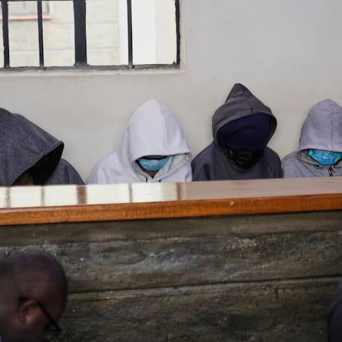 Students from Utumishi Girls Academy appear at Naivasha Law Courts in Nakuru, Kenya, Tuesday, June 2, 2026. (AP Photo/Brian Inganga)