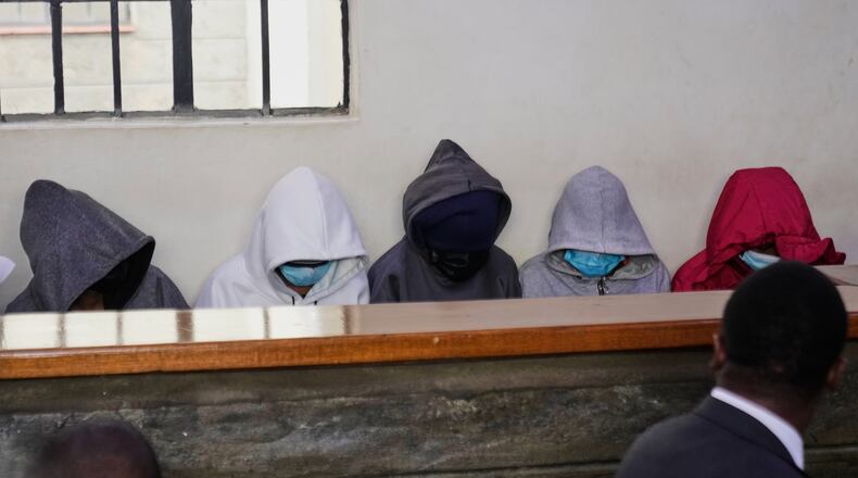 Students from Utumishi Girls Academy appear at Naivasha Law Courts in Nakuru, Kenya, Tuesday, June 2, 2026. (AP Photo/Brian Inganga)