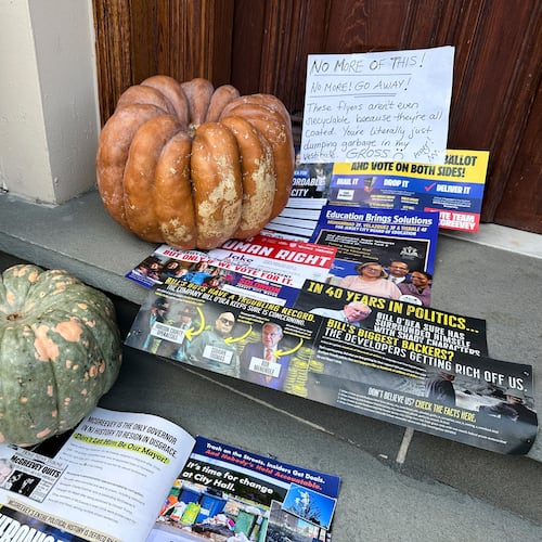 A Halloween display of unwanted campaign fliers sits in front of a private home in The Heights neighborhood of Jersey City, N.J, Thursday, Oct. 23, 2025. (AP Photo/Robert Yoon)