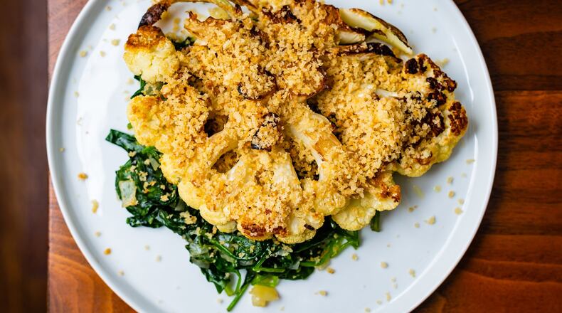 Quick Cauliflower Steaks with Sauteed Spinach. CONTRIBUTED BY HENRI HOLLIS