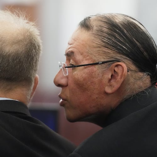 FILE - Nathan Chasing Horse, right, talks to his attorney Craig Mueller during his trial on charges of sexually abusing Indigenous women and girls, Jan. 13, 2026, in Las Vegas. (AP Photo/Ty ONeil, file)