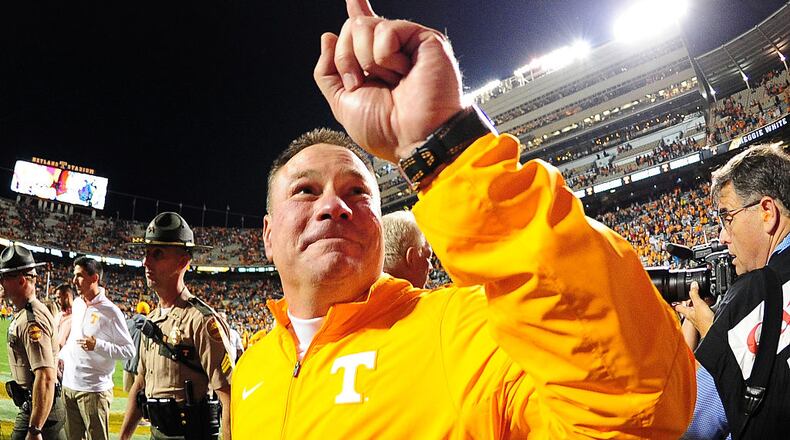 KNOXVILLE, TN - OCTOBER 10: Head Coach Butch Jones of the Tennessee Volunteers celebrates after the game against the Georgia Bulldogs on October 10, 2015 at Neyland Stadium in Knoxville, Tennessee. (Photo by Scott Cunningham/Getty Images)