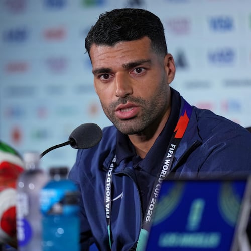 Iran's Mehdi Taremi speaks during a press conference ahead of his FIFA World Cup match against New Zealand in Inglewood, Calif., near Los Angeles, Sunday, June 14, 2026. (AP Photo/Andre Penner)