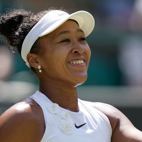 Naomi Osaka of Japan celebrates winning the third round women's singles match against Daria Kasatkina of Australia at the Wimbledon Tennis Championships in London, Friday, July 3, 2026.(AP Photo/Brian Inganga)