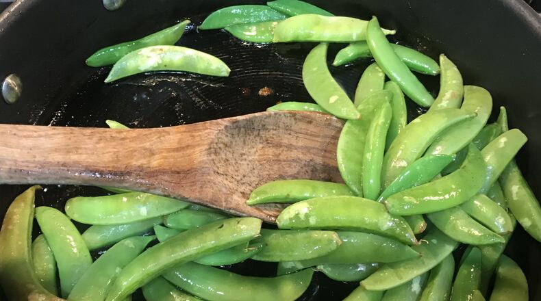 Charred Snap Peas with Chive Vinaigrette is an homage to this sweet springtime vegetable. Photo credit: Ligaya Figueras
