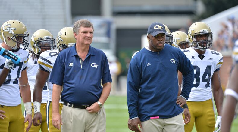 Georgia Tech coach Paul Johnson and graduate assistant Steven Sylvester before their game against Georgia Southern at Bobby Dodd Stadium on September, 13, 2014. HYOSUB SHIN / HSHIN@AJC.COM