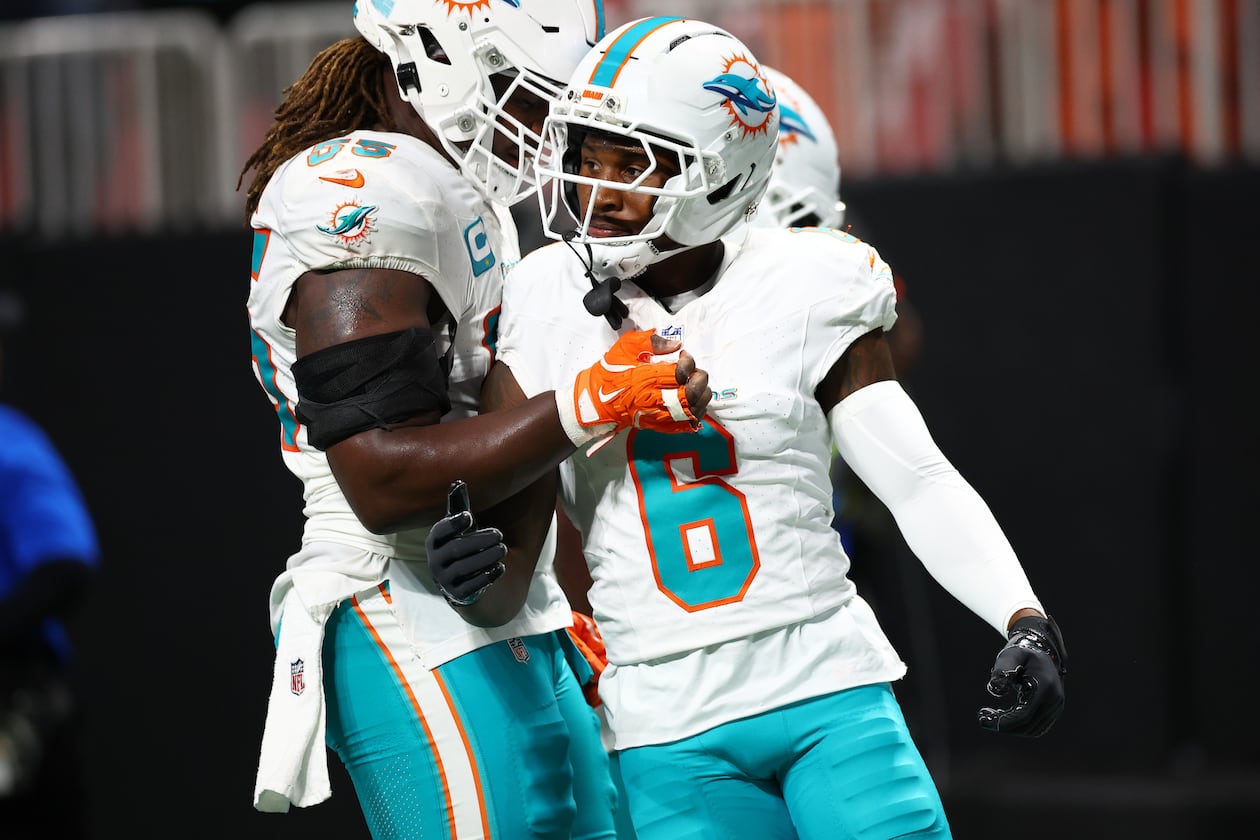 Miami Dolphins wide receiver Malik Washington (6) is congratulated after scoring a touchdown during the first half of an NFL football game against the Atlanta Falcons, Sunday, Oct. 26, 2025, in Atlanta. (AP Photo/Colin Hubbard)