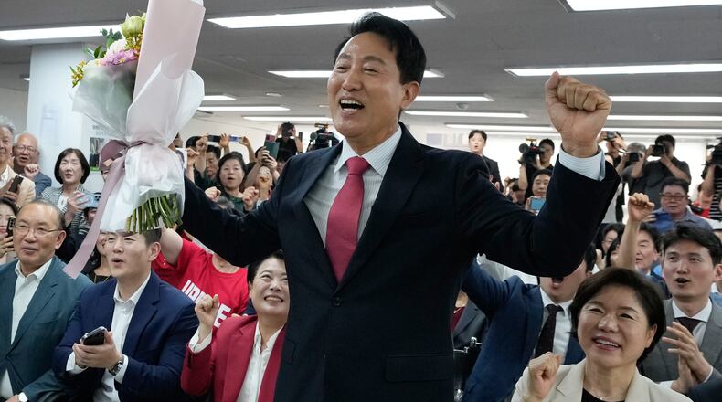 Seoul mayoral candidate Oh Se-hoon of the main opposition People Power Party celebrates his victory at his campaign office in Seoul, South Korea, Thursday, June 4, 2026. (AP Photo/Ahn Young-joon)