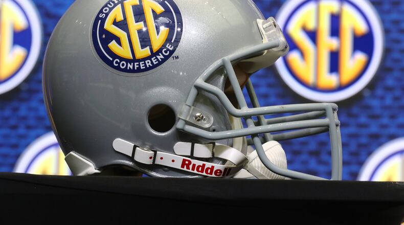 An SEC helmet sits on the stage for the start of SEC Media Days on Monday at the College Football Hall of Fame in Atlanta. (Curtis Compton / Curtis Compton@ajc.com)
