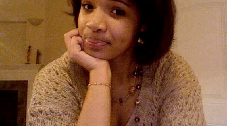 FILE - This undated file family photo provided by Damon Stewart shows 15-year-old Hadiya Pendleton of Chicago who was was shot and killed Jan. 29, 2013 in a park during a gang dispute she had nothing to do with about a mile from President Barack Obama’s Chicago home. Hadiya was laid to rest Feb. 9, 2103. Since her death, the number of homicides and other violent crimes that turned Chicago into a national symbol of gun violence have fallen sharply as the city and police have changed their strategies. (AP Photo/Courtesy of Damon Stewart, File)