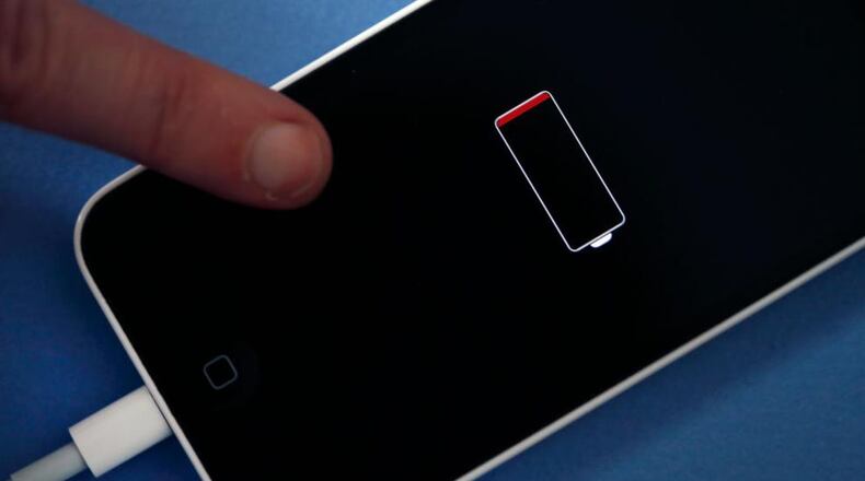 An Apple iPhone 5 with a low battery is pictured here. Apple has admitted that it was clamping the processors of old iPhone at certain stages of their life cycles, to deliberately slow down the performance of batteries on older models of iPhones.