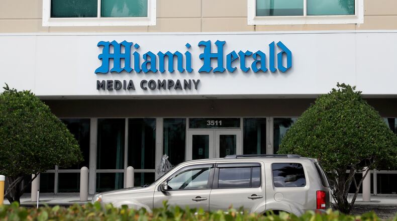 FILE - The Miami Herald newspaper office building is seen on Feb. 13, 2020, in Doral, Fla. (AP Photo/Wilfredo Lee, File)