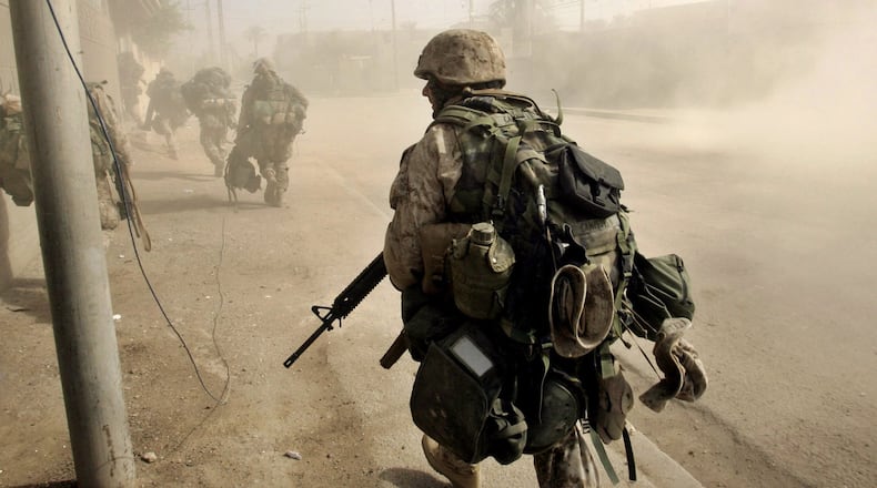 U.S. Marines try to push into the center of Fallujah, Iraq in Nov. 2004 during a days-long battle against Sunni Muslim insurgents. (AP Photo/Anja Niedringhaus)