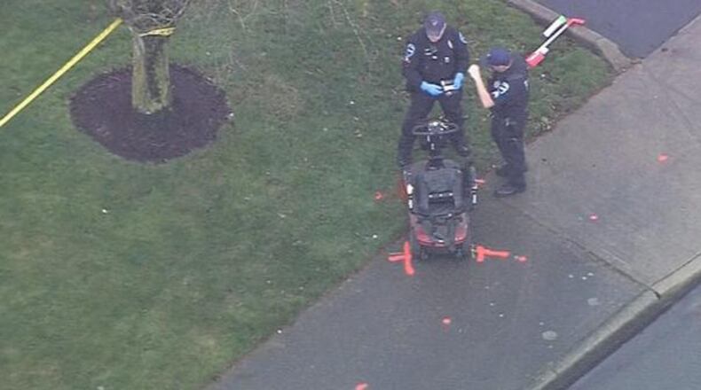 Police say a woman was hit and killed by a UPS truck when the driver failed to see her.