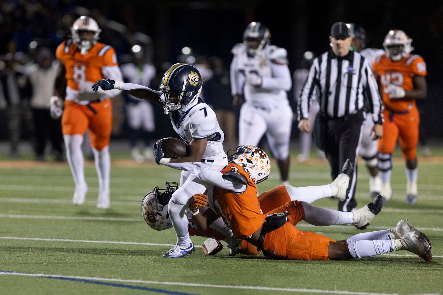 Douglas County’s Jacahi Streeter (7) is tackled. (Photo/Jenn Finch, AJC)