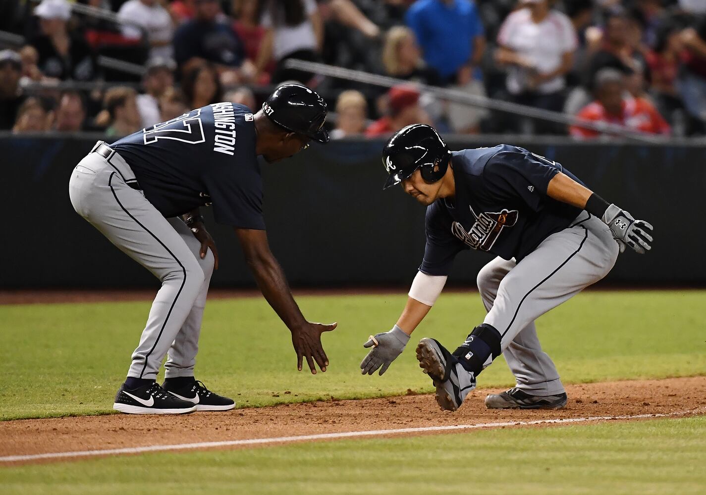 Photos: Suzuki carries Braves to win over Diamondbacks