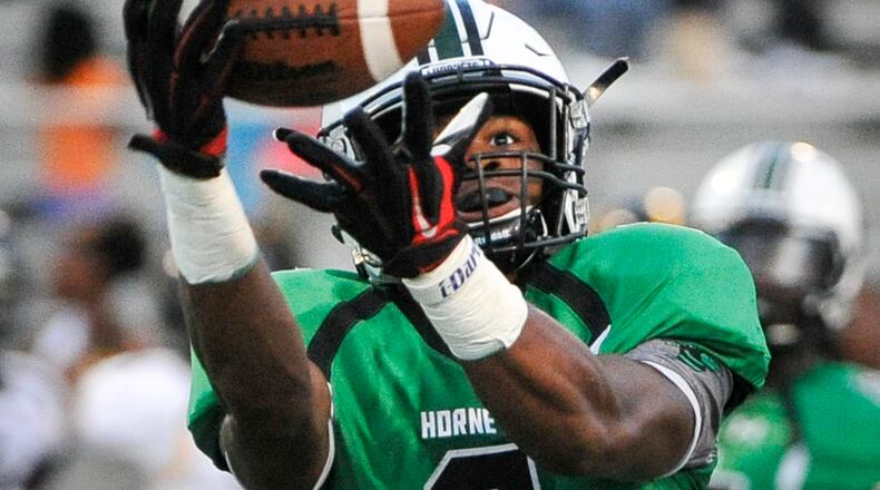 Roswell receiver Corey Reed makes a catch for a touchdown in 2016.