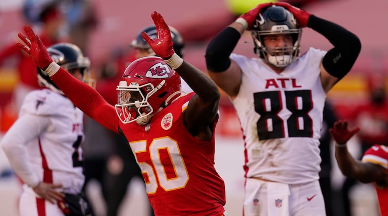 Kansas City Chiefs linebacker Willie Gay (50) reacts next to Atlanta Falcons' Luke Stocker (88) after Falcons place kicker Younghoe Koo missed a game-tying 39-yard field goal during the second half Sunday, Dec. 27, 2020, in Kansas City, Mo. The Chiefs won 17-14. (Charlie Riedel/AP)
