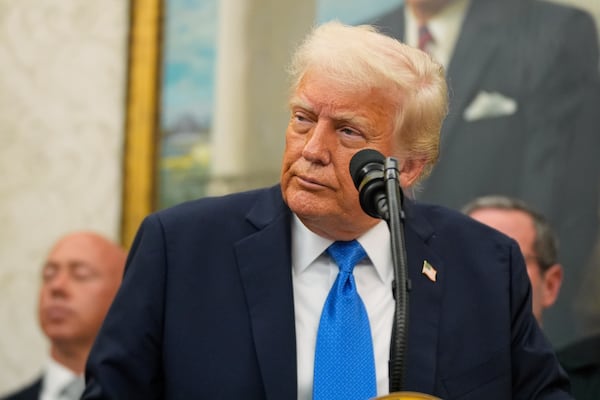 President Donald Trump listens to a question during an event to present law enforcement officers with an award in the Oval Office at the White House, Monday, May 19, 2025. (AP Photo/Manuel Balce Ceneta)