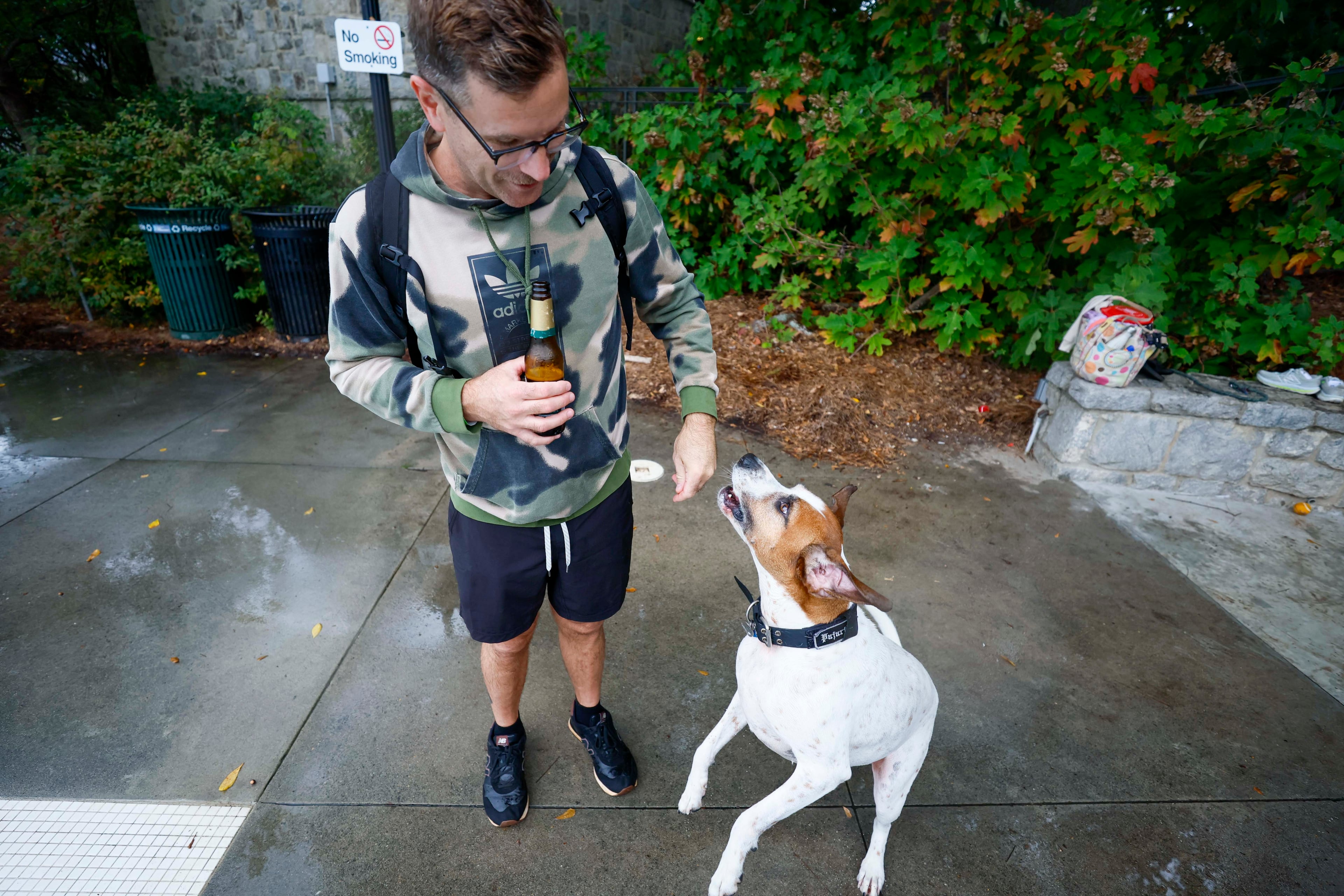 Stephen McKean plays with his dog, Byrd (6), during the XV annual Splish Splash Doggie Bash at Piedmont Park on Sunday, October 5, 2025. The proceeds support Piedmont Park Dog Parks. (Miguel Martinez/ AJC)